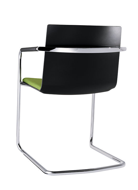 Ergonomischer schwarzer Freischwinger mit grünem Sitzpolster und verchromtem Rahmen, ideal für dynamisches Sitzen.