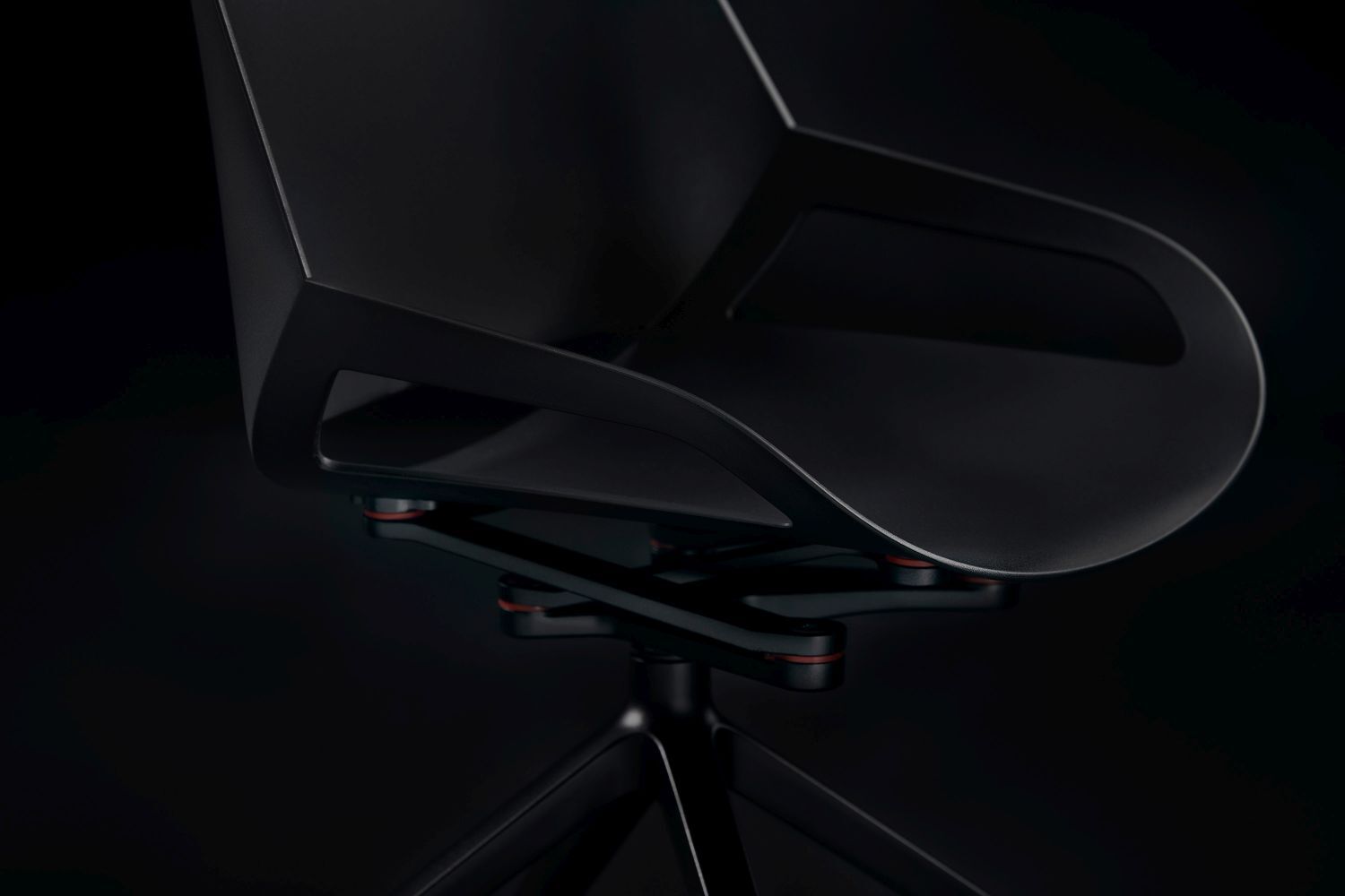Moderner ergonomischer Bürostuhl mit schwarzer Sitzfläche und stilvollem Design auf dunklem Hintergrund.