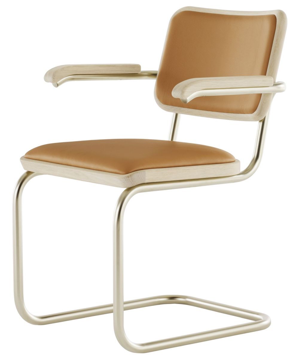 Ergonomischer Freischwinger mit hellbrauner Polsterung und gebogenem Metallgestell für komfortables, dynamisches Sitzen.