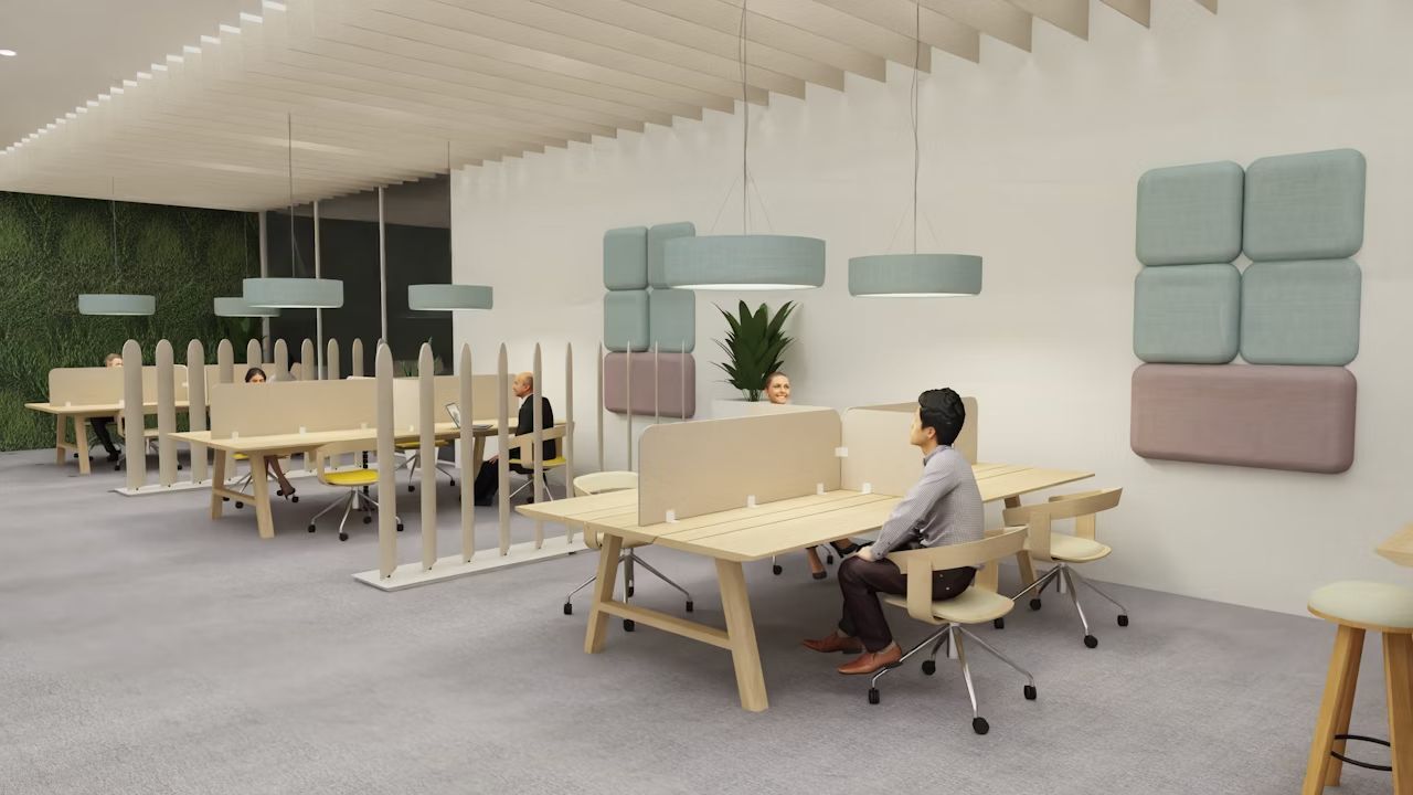 Moderne Büroumgebung mit ergonomischen Stühlen und separierten Arbeitsbereichen, fördert dynamisches Sitzen und Produktivität.