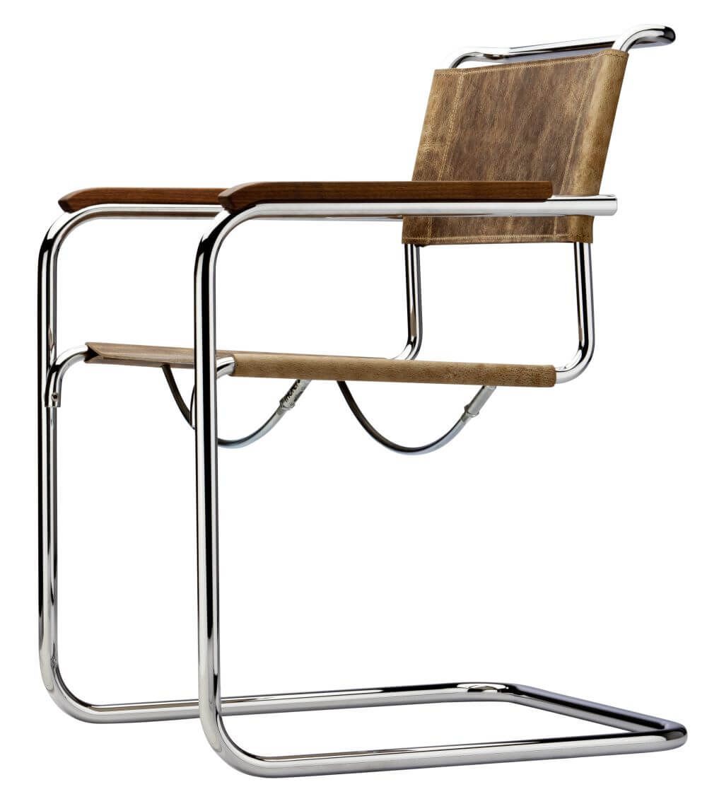 Moderner Freischwingerstuhl mit verchromtem Gestell und Holzsitz, ideal für ergonomisches Sitzen im Büro.