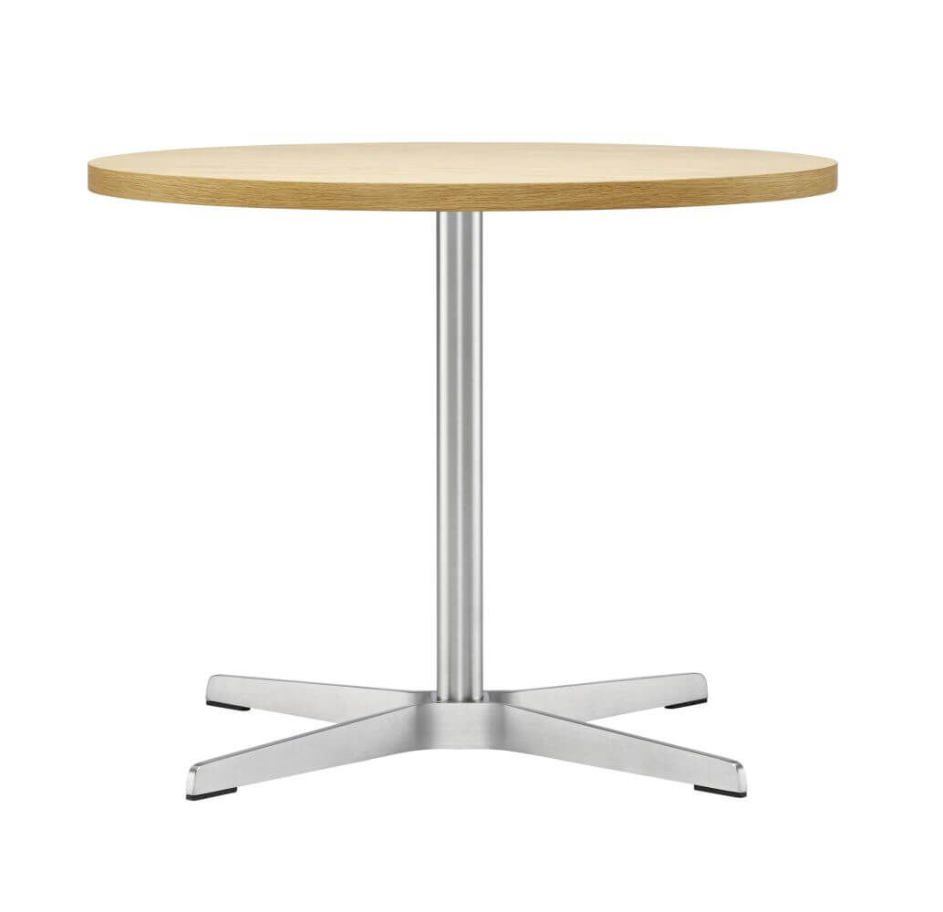 Runder Holztisch mit stabilem Metallgestell und vier Beinen, ideal für ergonomische Arbeitsumgebungen.