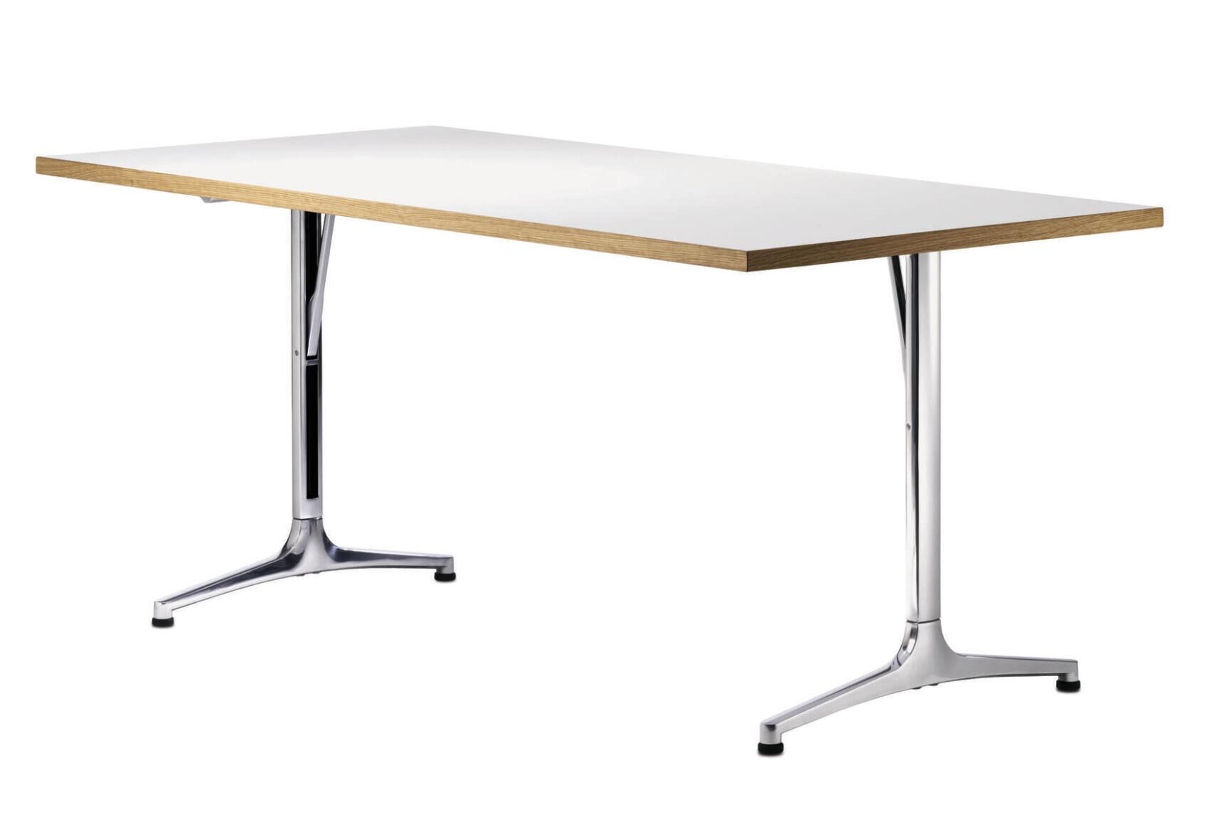 Moderner Schreibtisch mit schlanken, verchromten Beinen und einer weißen Tischplatte mit Holzrand.