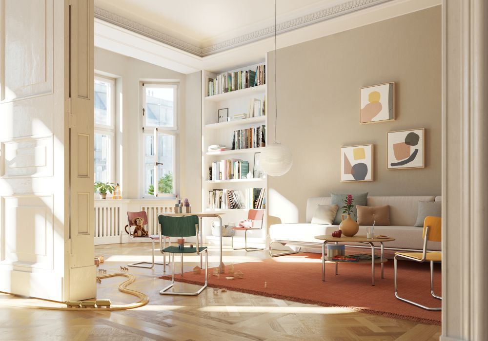 Helles Wohnzimmer mit modernen Möbeln, Regalen voller Bücher und abstrakter Kunst an der Wand.