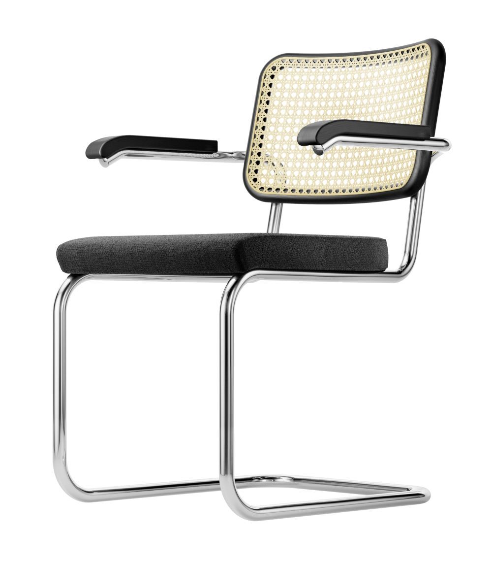 Moderner Freischwinger mit Chromrahmen, schwarzem Polster und geflochtener Rückenlehne, für ergonomisches Sitzen.