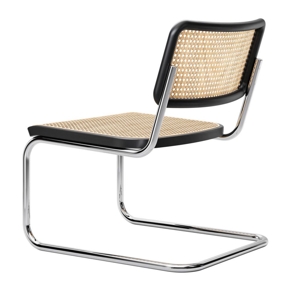 Klassischer Freischwingerstuhl mit Geflecht und Chromgestell, ideal für ergonomisches und stilvolles Sitzen.