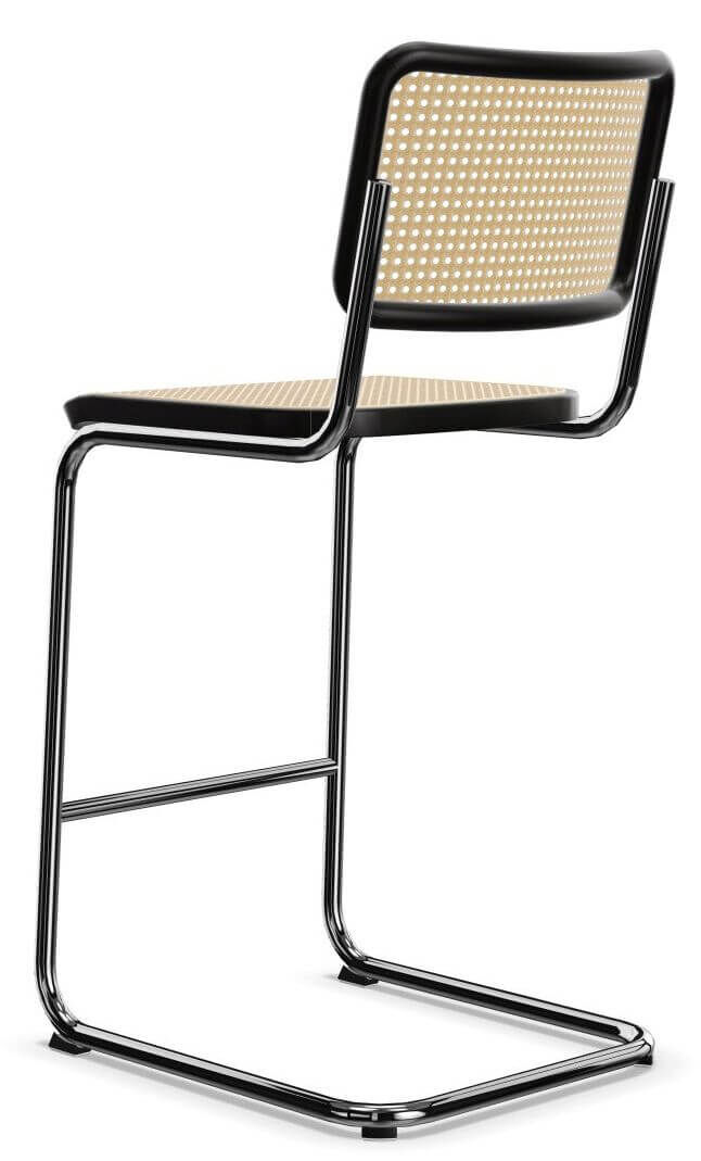 Moderner ergonomischer Stuhl mit freischwingendem Metallrahmen und perforierter Rückenlehne für dynamisches Sitzen.