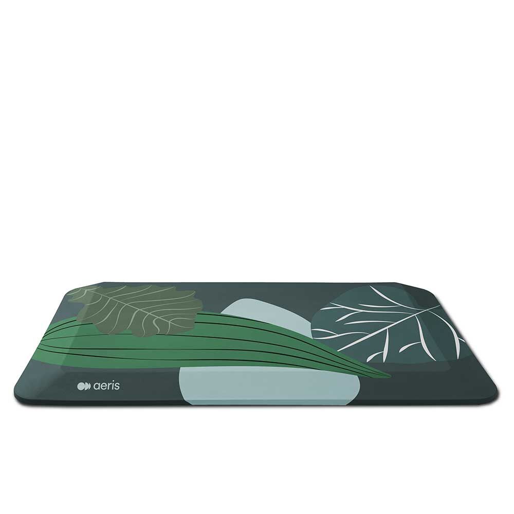 Ergonomische Bodenmatte von Aeris mit grünem Blätterdesign, für komfortables Stehen im Büro oder Homeoffice.