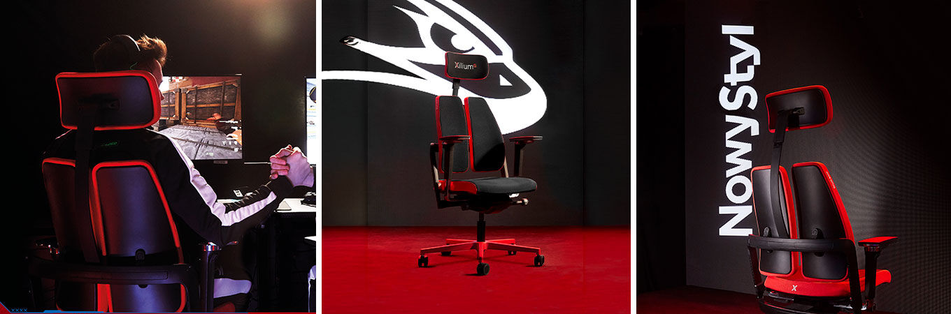 Ergonomischer Bürostuhl mit rotem und schwarzem Design in Gaming-Umgebung und bei Nowy Styl Ausstellung gezeigt.