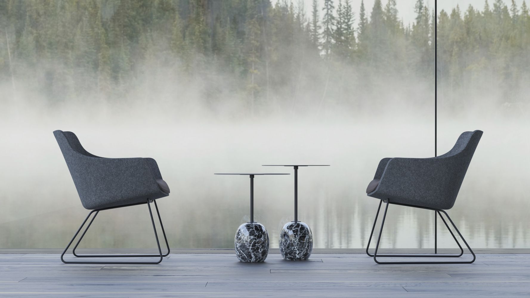 Zwei ergonomische Stühle und Tische aus Marmor vor einem nebelverhangenen See mit dichter Waldkulisse.