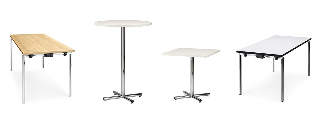 Vier moderne, ergonomische Bürotische mit unterschiedlichen Formen und Tischplatten aus Holz und weißem Material.