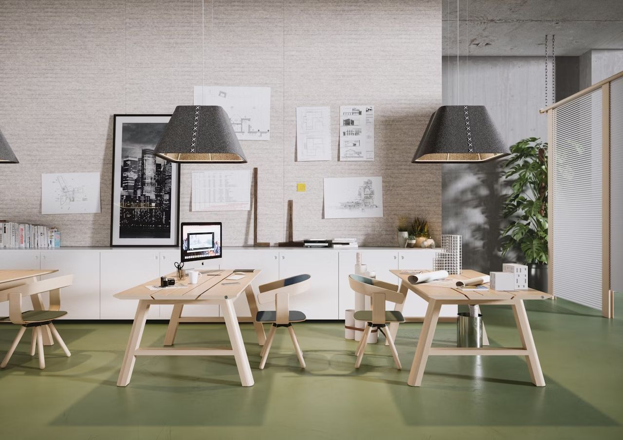 Moderner Büroraum mit ergonomischen Sitzmöbeln und stilvollen Details, betont gesundes Arbeiten und kreative Gestaltung.